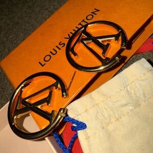 Louis Vuitton Gold Logo earrings Set. Worn 3 times. Great condition.